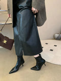 Stiletto heel ankle boots in black faux leather with pointed toe, tassel detail and back zipper, sizes 35-40