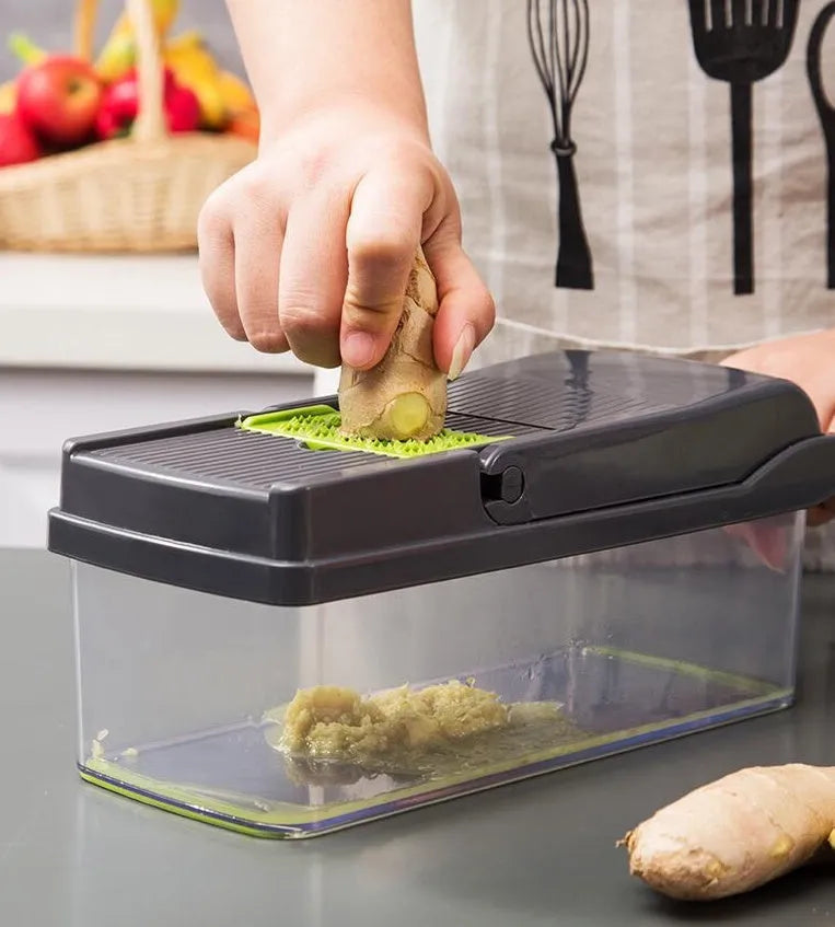 Multifunctional vegetable cutter with 7 stainless steel blades on a kitchen counter, compact 31.8 x 11.5 x 11.5 cm size