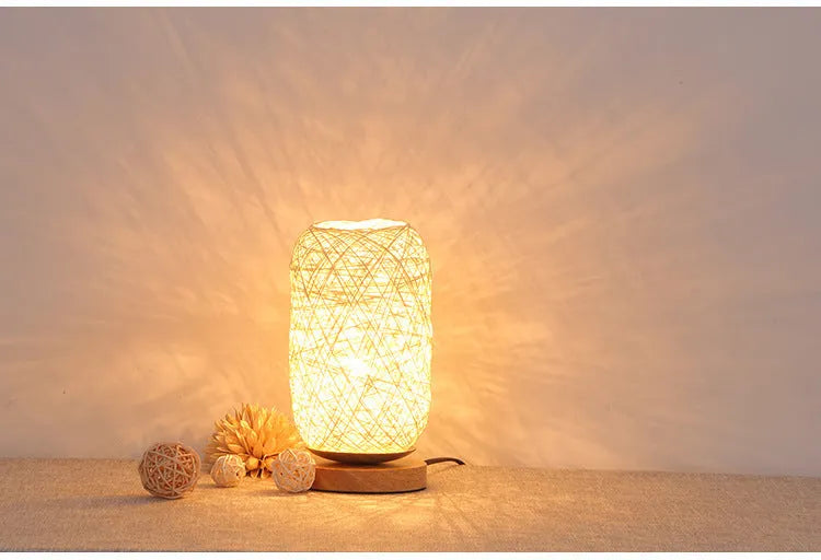 Brown hemp rope Sepak Takraw desk lamp with wooden base and USB cable.