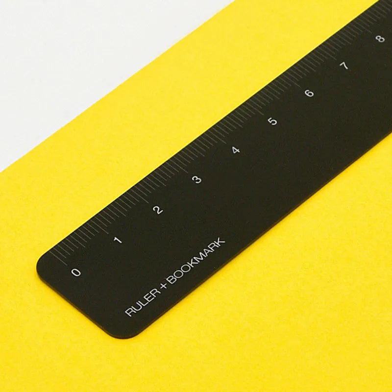 Black grey aluminium bookmark ruler with laser-engraved 15cm measuring scale