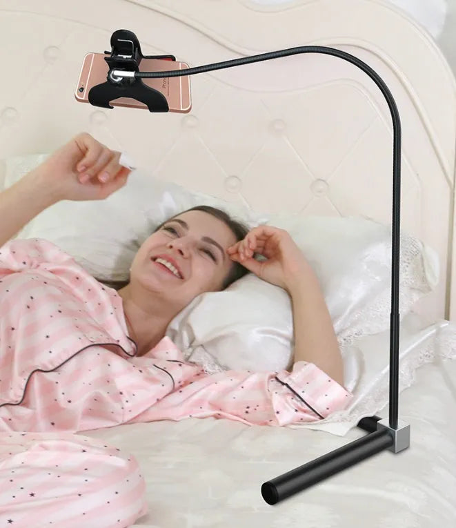 Black mobile phone bed bracket with clamp mount and overhead support shelf for bedside use