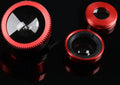 Three mobile phone camera lenses: fisheye, wide-angle, and macro, with attachment clip, in assorted colours