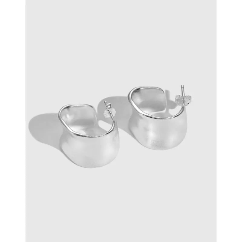 Pair of 925 silver women's ear studs with a wide irregular curved shape, 12 x 17.5mm, silver colour