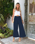 Women's high-waist straight-leg cropped trousers in cotton, shown in a light colour with a front pleat detail.