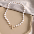 Vintage gold necklace with heart pendant on pearl chain, adjustable length 41-50cm
