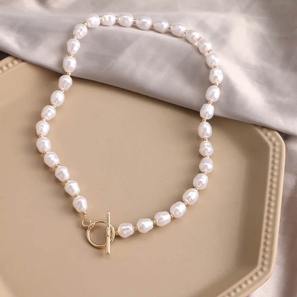 Vintage gold necklace with heart pendant on pearl chain, adjustable length 41-50cm