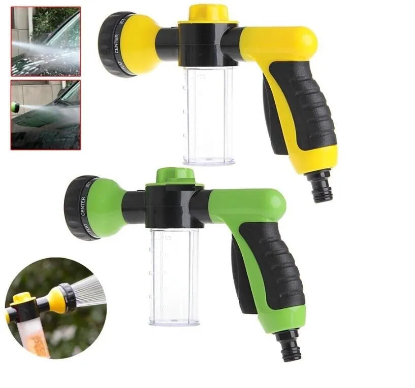 Green high-pressure foam spray gun with adjustable nozzle and attached water pipe for car and garden cleaning.