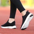 Women's running shoes with fly weaving upper in black, pink, and white colour options