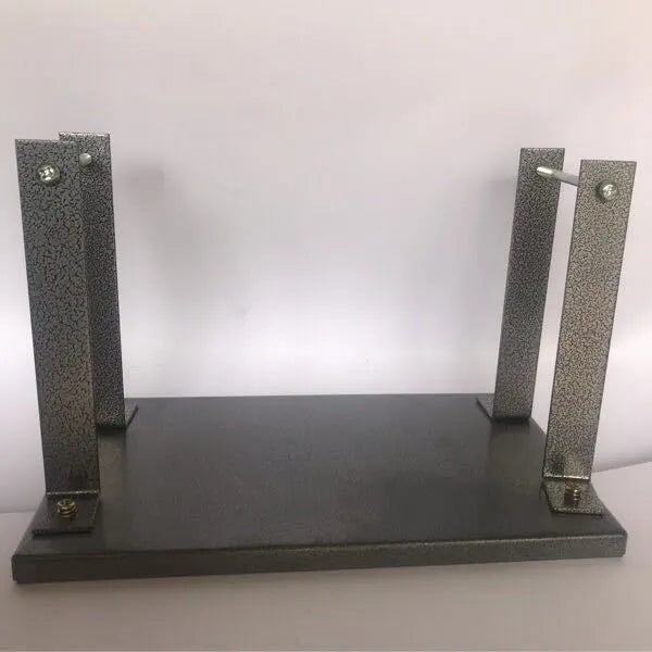 Black iron flip chip bracket for mounting a portable electric planer as an inverted benchtop tool.