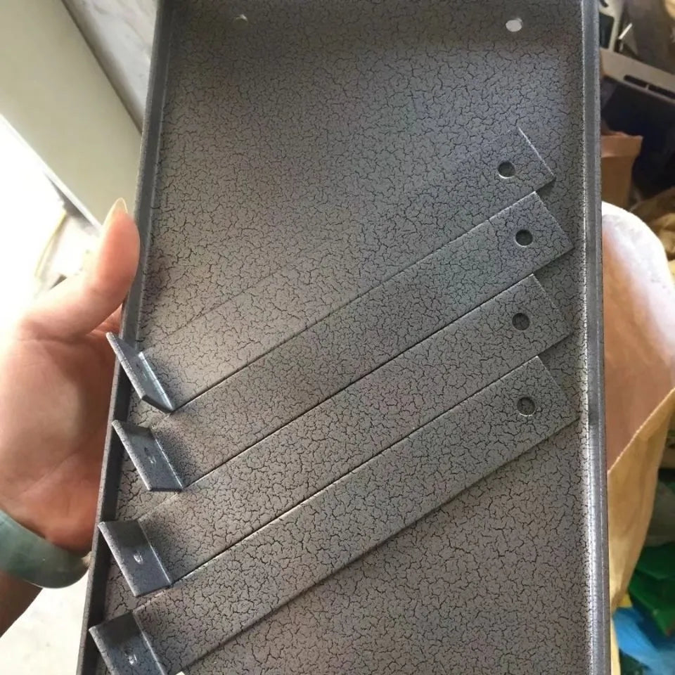 Black iron flip chip bracket for mounting a portable electric planer as an inverted benchtop tool.