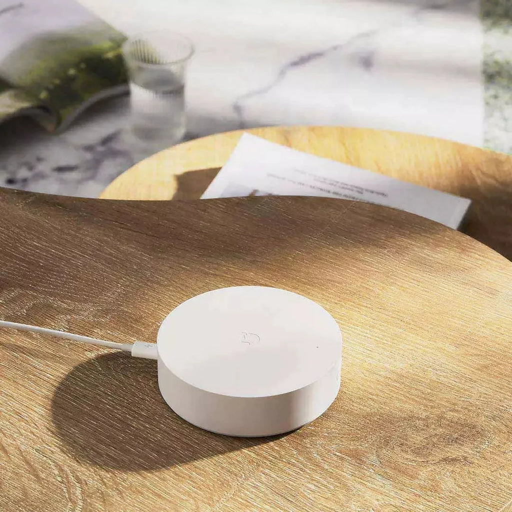 White Xiaomijia smart home gateway with UK plug for wireless wall control of connected devices