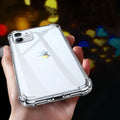 Transparent solid white silicone shockproof case for Apple iPhone on a table.
