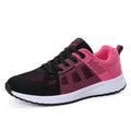 Women's white high-top casual sneakers with hollow-out design and a black cross-bind strap.