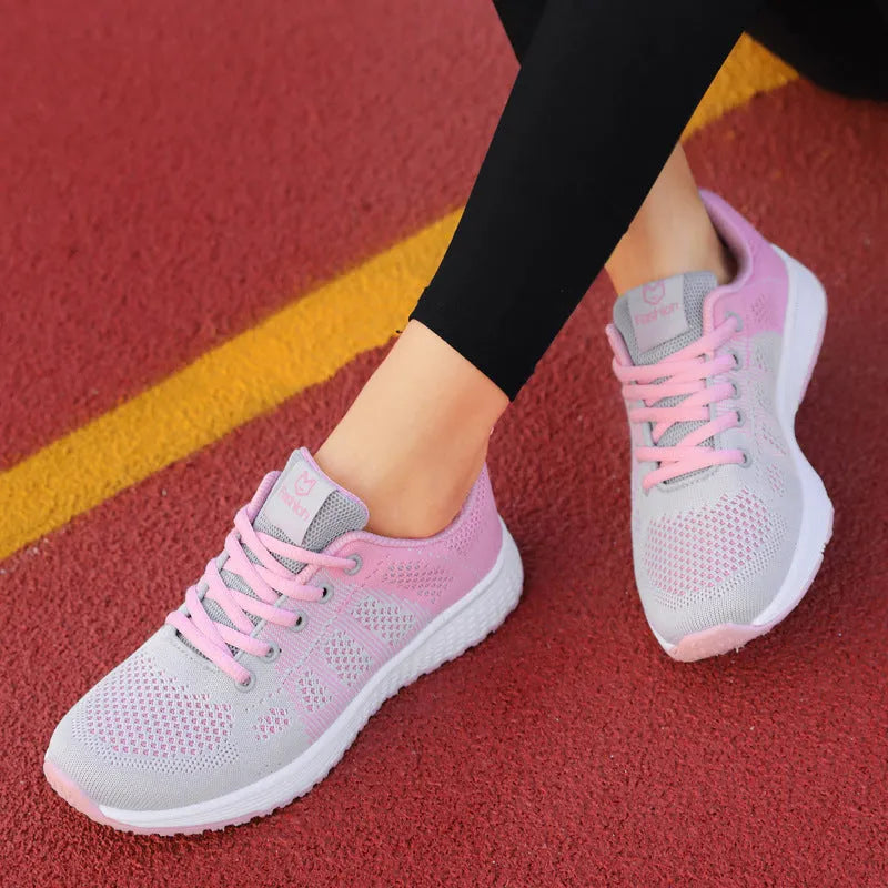 Women's white high-top casual sneakers with hollow-out design and a black cross-bind strap.