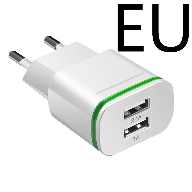 Universal travel charging head with USB interface and built-in light in black, for smartphones and tablets