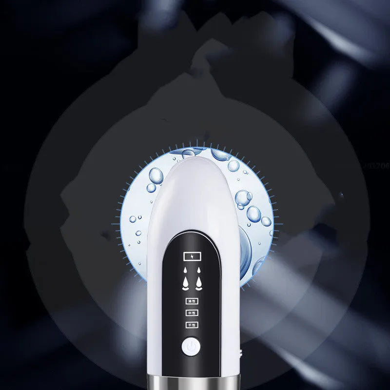Electric vacuum blackhead acne pore cleaner with six probes and USB charger on white background