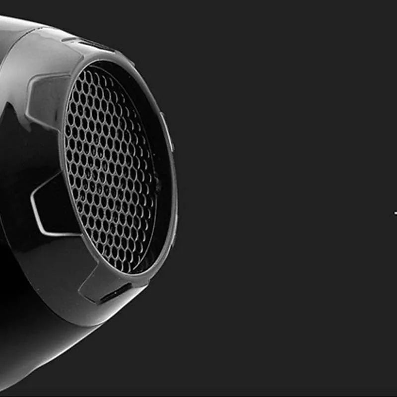 Black 2000W negative ion hair dryer with five speed controls, nozzles, and modelling hood on a white background