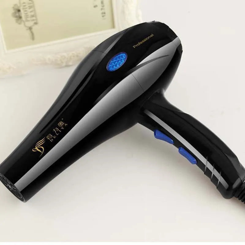 Black 2000W negative ion hair dryer with five speed controls, nozzles, and modelling hood on a white background
