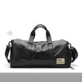 Black waterproof PU leather sports training bag with multiple organisational pockets