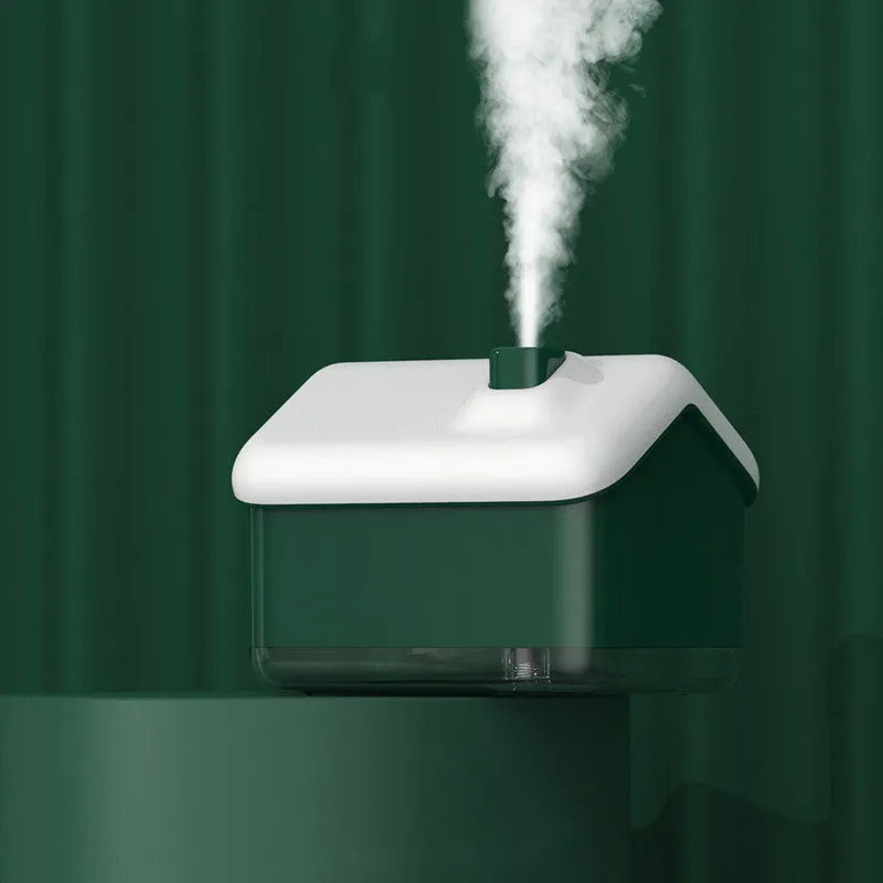 White igloo-shaped ultrasonic humidifier and essential oil diffuser with LED light on a wooden table