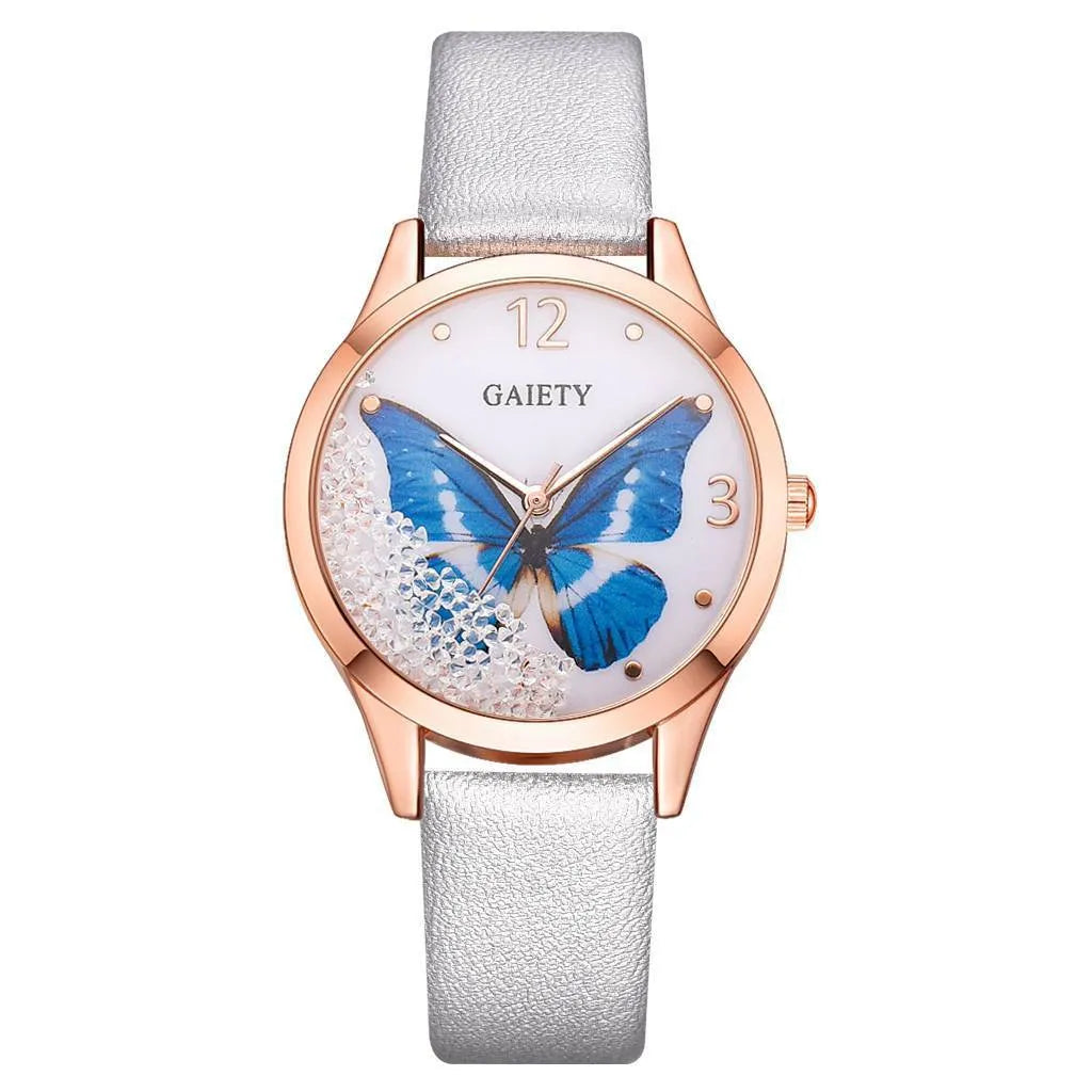 Gaiety ladies watch with removable rhinestone butterfly on a leather strap, showing a round silver dial.