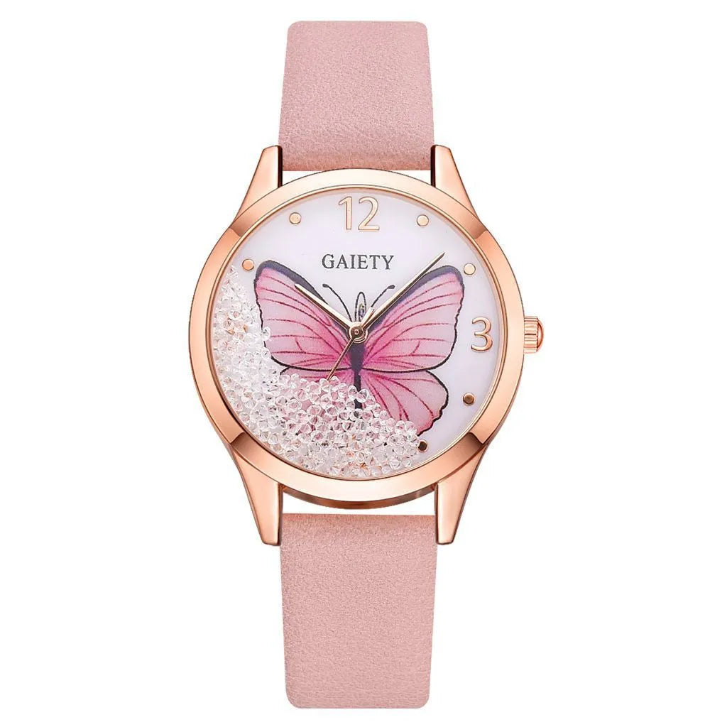 Gaiety ladies watch with removable rhinestone butterfly on a leather strap, showing a round silver dial.