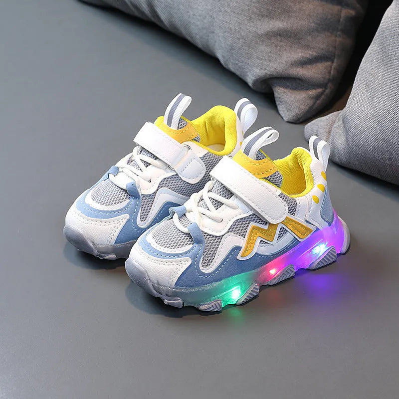 Kids black, pink, and grey breathable mesh Velcro sneakers with rubber soles.