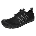 Outdoor water shoes with mesh upper and rubber sole shown in black, suitable for river tracing and hiking.