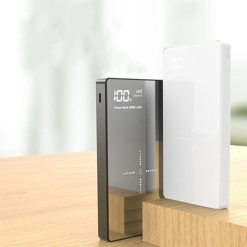 Black or white wireless power bank with 20000 mAh capacity, digital display, two USB outputs, size 73 mm x 153 mm x 22 mm.