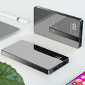 Black or white wireless power bank with 20000 mAh capacity, digital display, two USB outputs, size 73 mm x 153 mm x 22 mm.