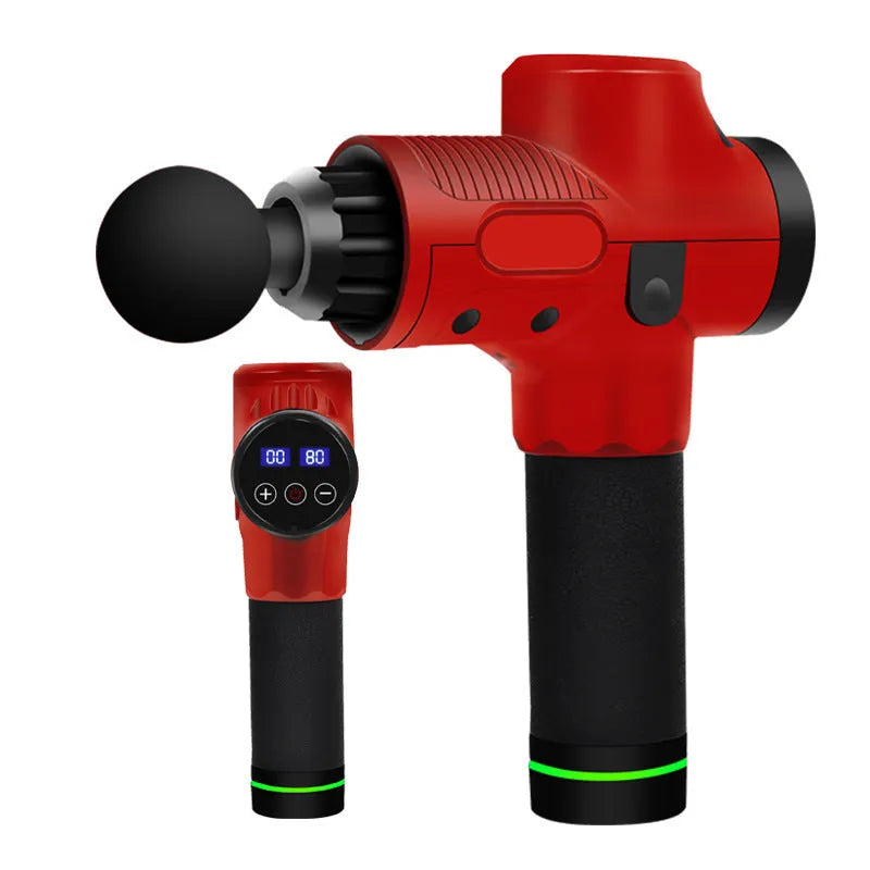 Black electric percussion massage gun with 7 different coloured attachment heads on a table.
