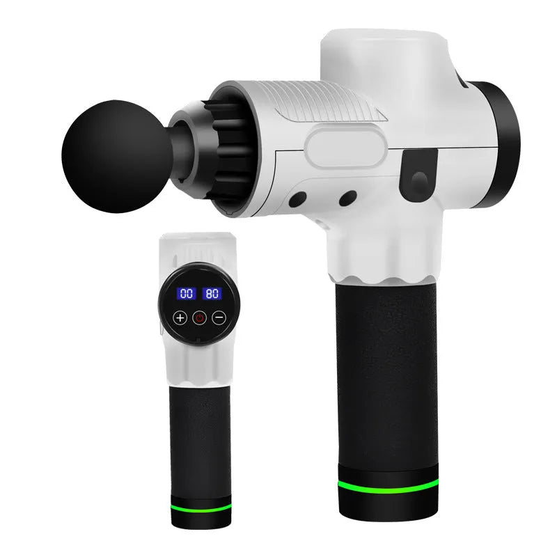 Black electric percussion massage gun with 7 different coloured attachment heads on a table.
