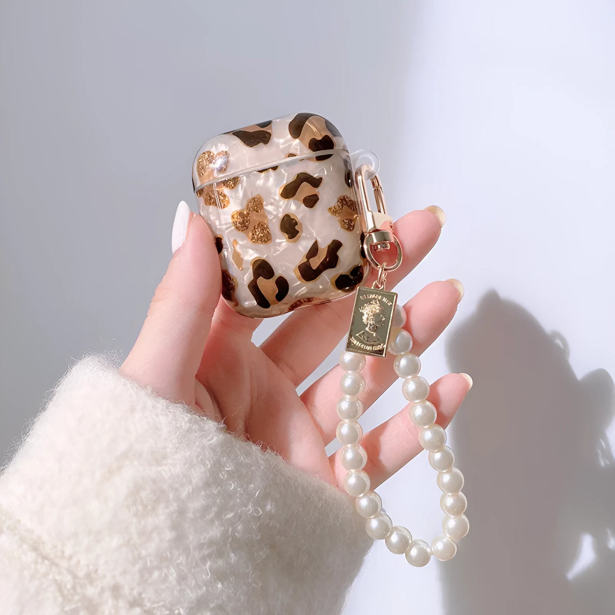 Shell yellow leopard print TPU AirPods case with flip opening and optional ornaments