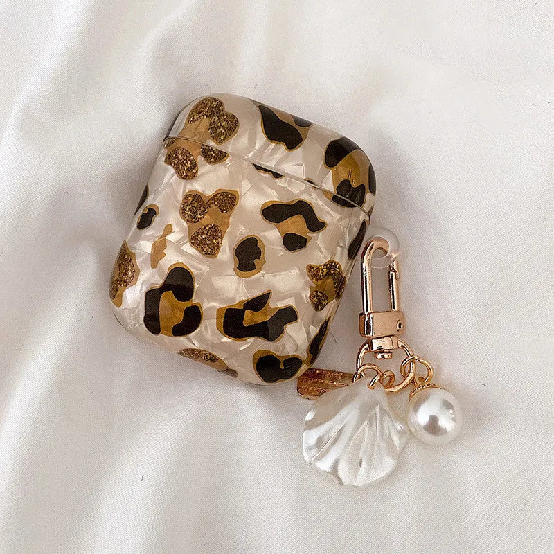 Shell yellow leopard print TPU AirPods case with flip opening and optional ornaments