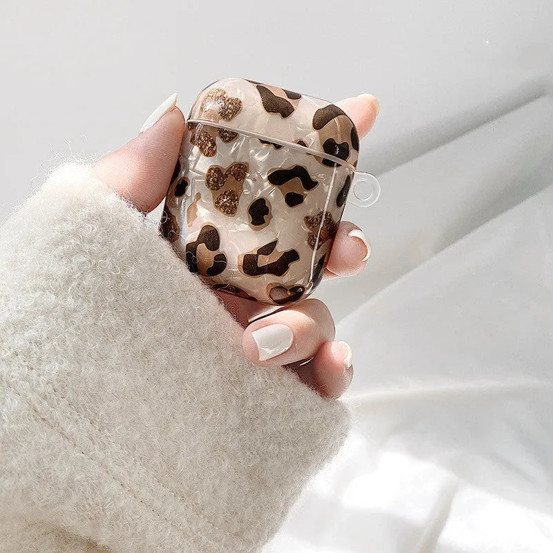 Shell yellow leopard print TPU AirPods case with flip opening and optional ornaments