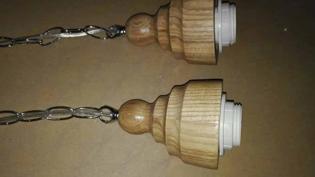 Glass wood grain single head pendant light with adjustable cord on white background