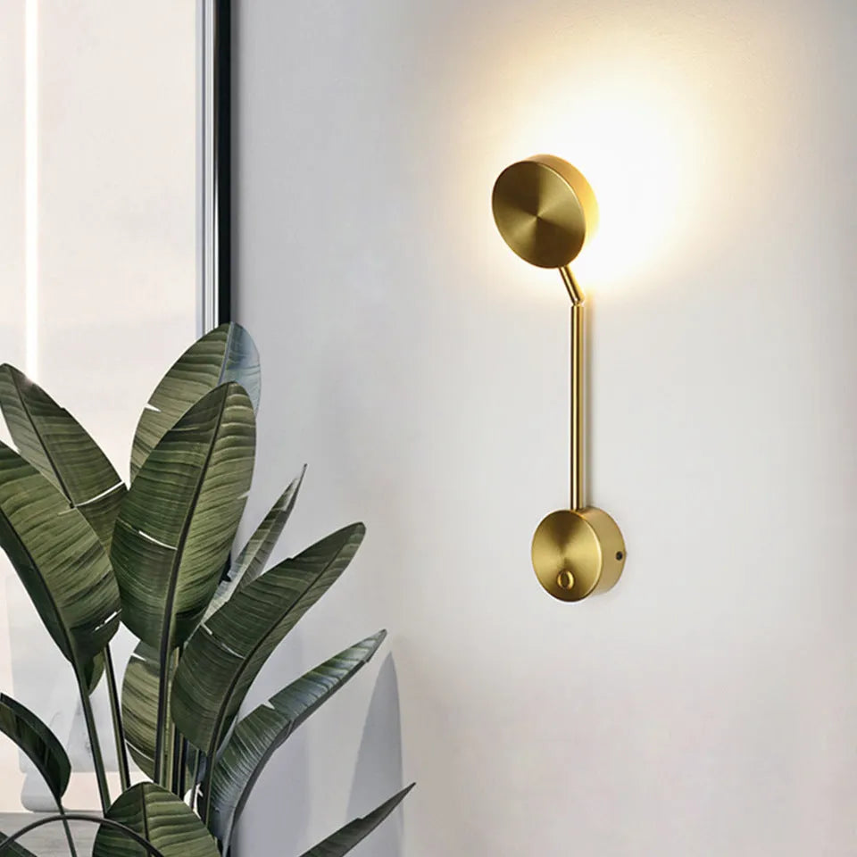 Gold square LED wall lamp 100x400mm with acrylic shade and rotary key switch on white wall