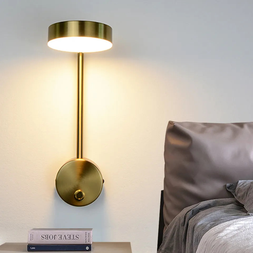 Gold square LED wall lamp 100x400mm with acrylic shade and rotary key switch on white wall