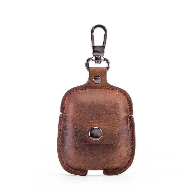 Crazy horse cowhide leather AirPods cover with keychain and charging hole, 6.8cm x 12.3cm, in blue, brown, coffee, or red.