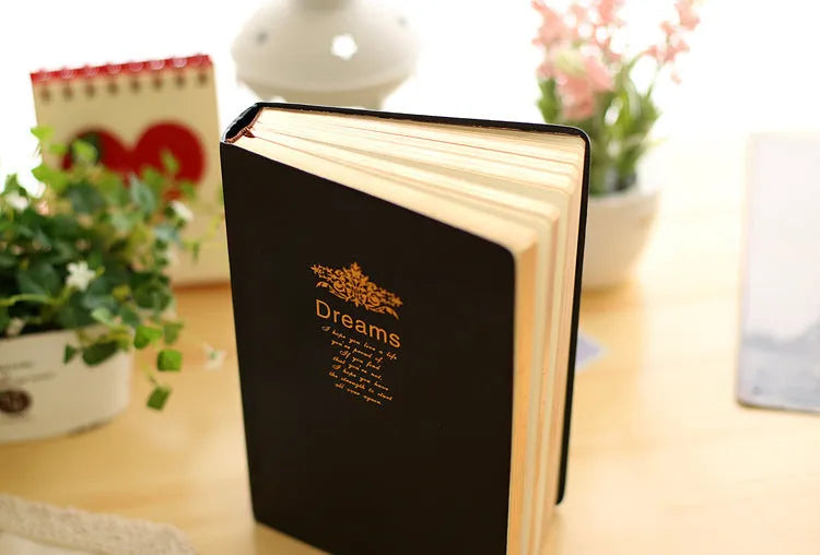Jingu Super Thick Notebook with imitation leather cover, showing its photo colour and substantial 35mm depth.