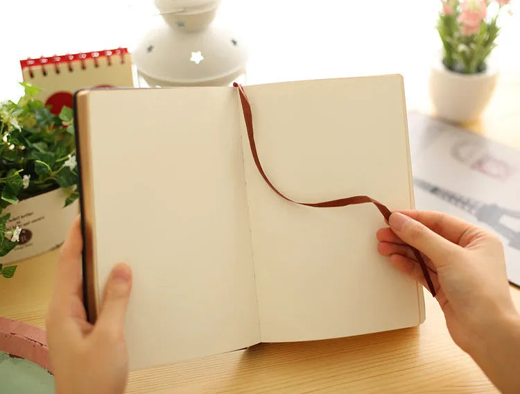 Jingu Super Thick Notebook with imitation leather cover, showing its photo colour and substantial 35mm depth.