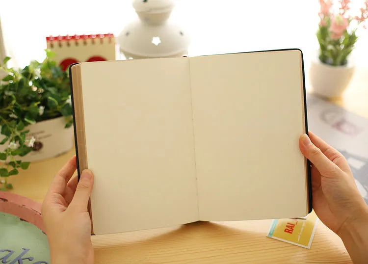 Jingu Super Thick Notebook with imitation leather cover, showing its photo colour and substantial 35mm depth.