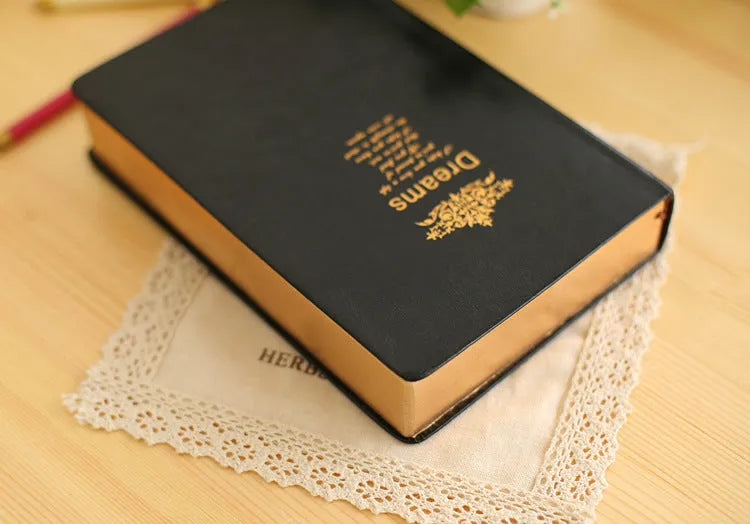 Jingu Super Thick Notebook with imitation leather cover, showing its photo colour and substantial 35mm depth.