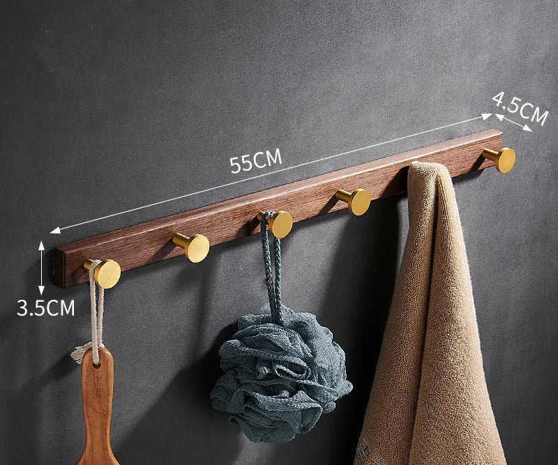 Black walnut bathroom clothes hooks with aluminium frame and brass finish in perforated row design