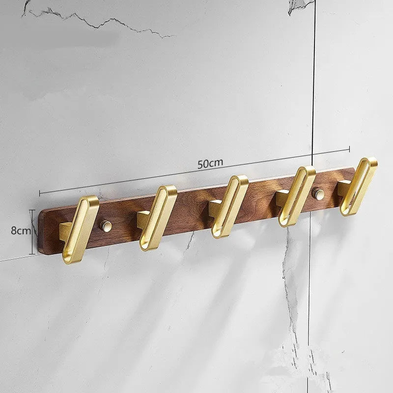 Black walnut bathroom clothes hooks with aluminium frame and brass finish in perforated row design