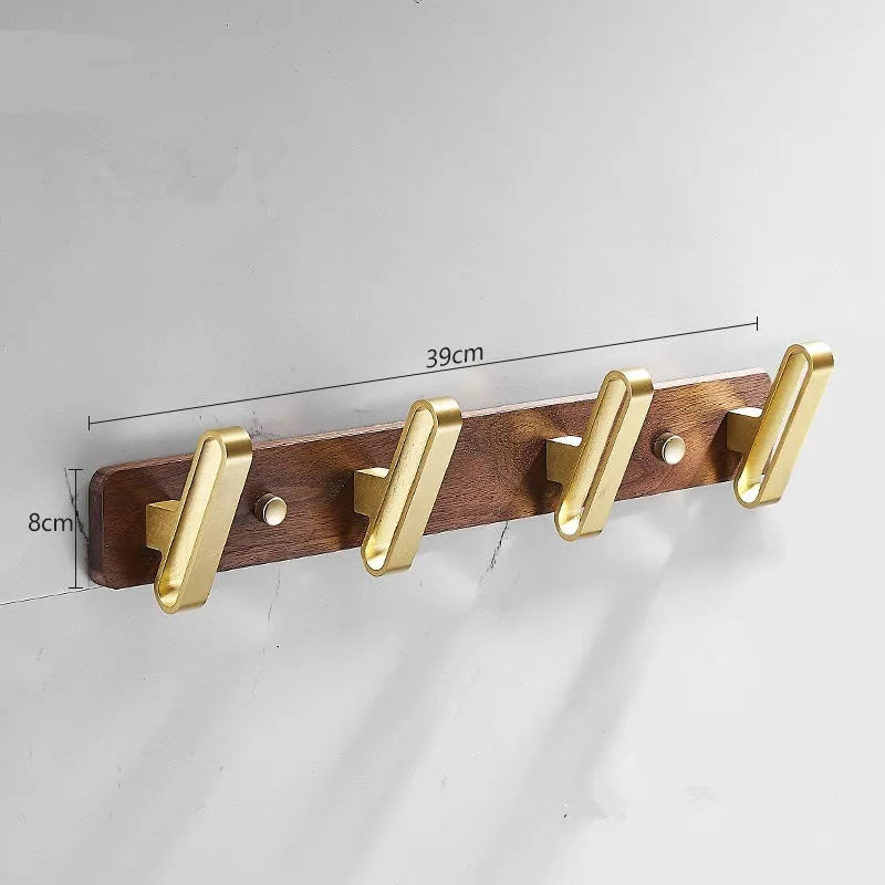 Black walnut bathroom clothes hooks with aluminium frame and brass finish in perforated row design