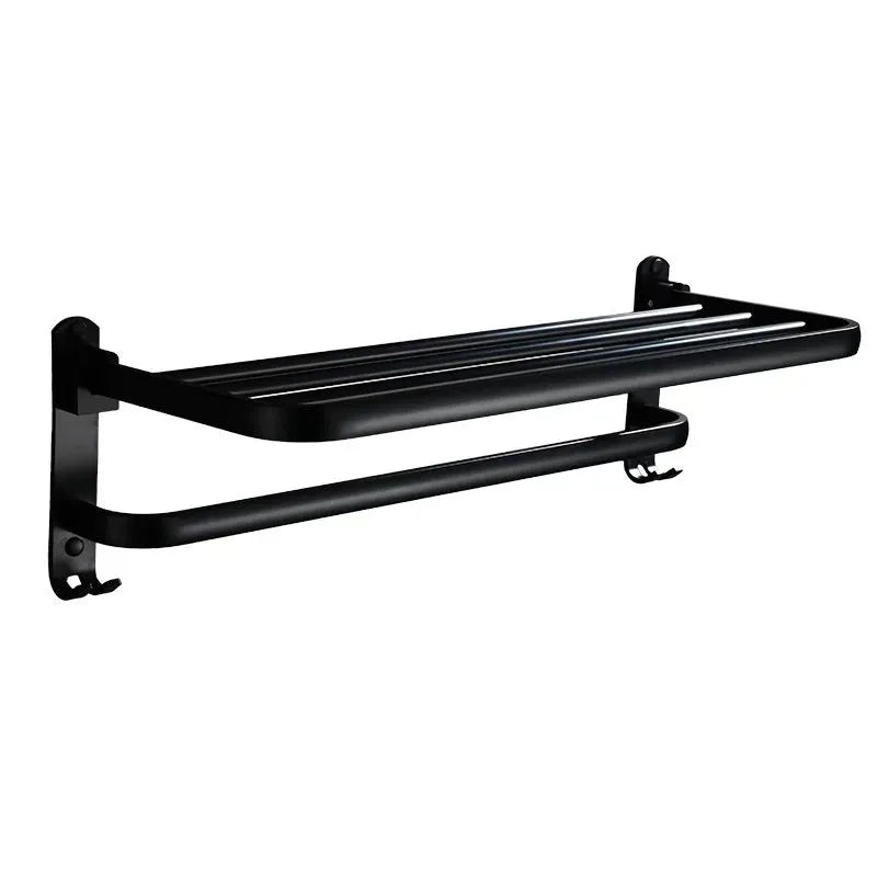 Silver anodised aluminium two-tier folding towel rack mounted on a bathroom wall.