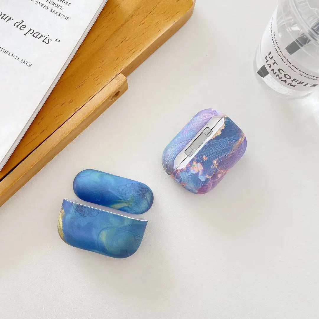 Blue and pink watercolour hard plastic protective case for AirPods Pro and AirPods 1 and 2.