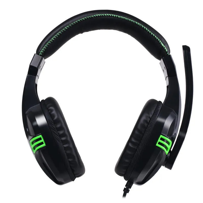 Black wired gaming headset with microphone placed on a desk, 3.5mm plug visible
