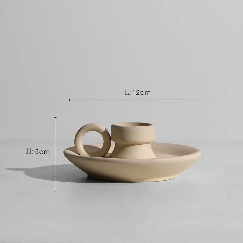 Modern minimalist painted ceramic vase with geometric shape, handmade pottery ornament on shelf